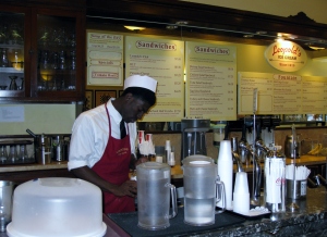 Counter and employee at Leopold's